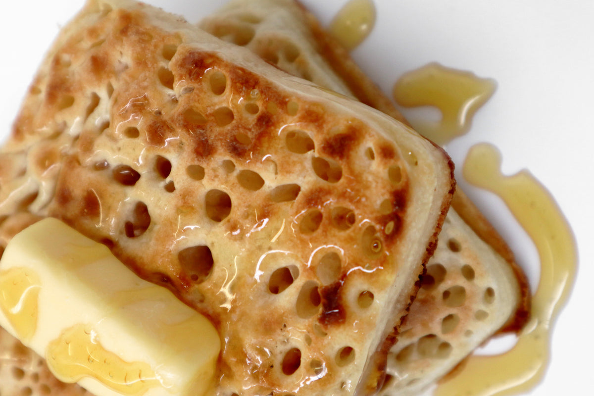 delicious vegan plant-based gluten free free from golden Liberate Crumpets dripping with butter